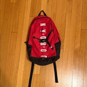 Nike Air Jordan Jumpman Split Backpack in red and black.